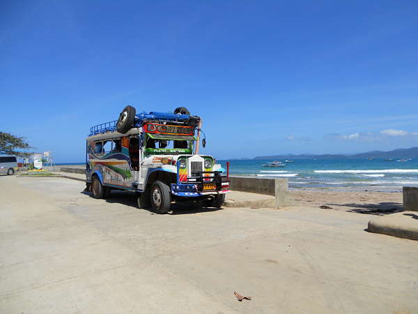 A jeepney parked at Sabang Wharf awaiting passengers