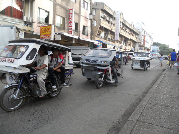 Riding the Filipino  tricycle ideally squeezed in with four other passengers is a travel experience in itself