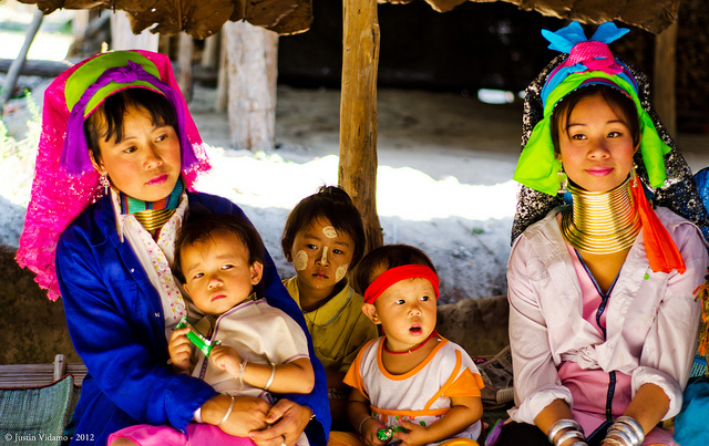 Karen long neck family in their colorful garb