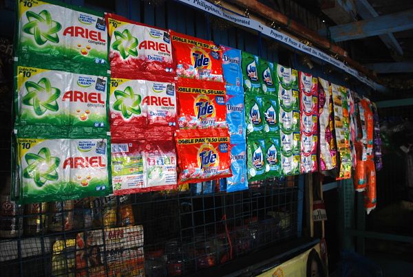 Small sized packs of detergent, shampoo, dishwashing soap and diapers